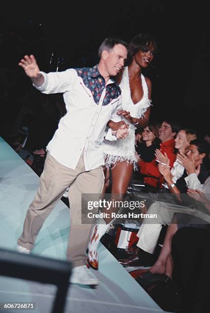 Fashion designer Tommy Hilfiger and model Naomi Campbell at a fashion show for his Spring 2000 collection in New York City, 15th September 1999.