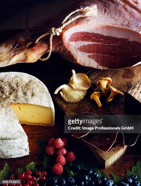 cheese,mushrooms,raw ham and summer fruit - cantharellus tubaeformis stock pictures, royalty-free photos & images