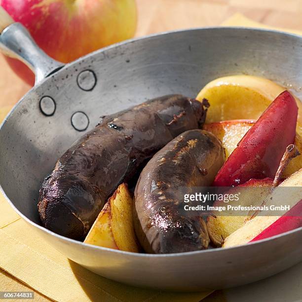 blood sausage with apples - black pudding stock pictures, royalty-free photos & images