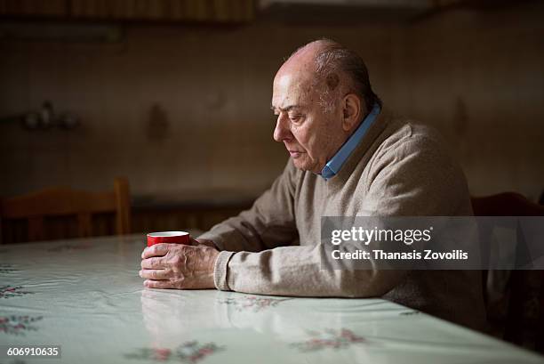 portrait of a senior man - alone stock-fotos und bilder