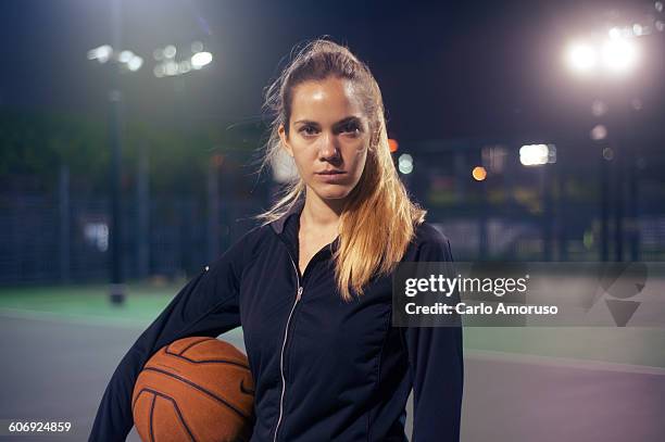 young woman exercising - sport determination stock-fotos und bilder