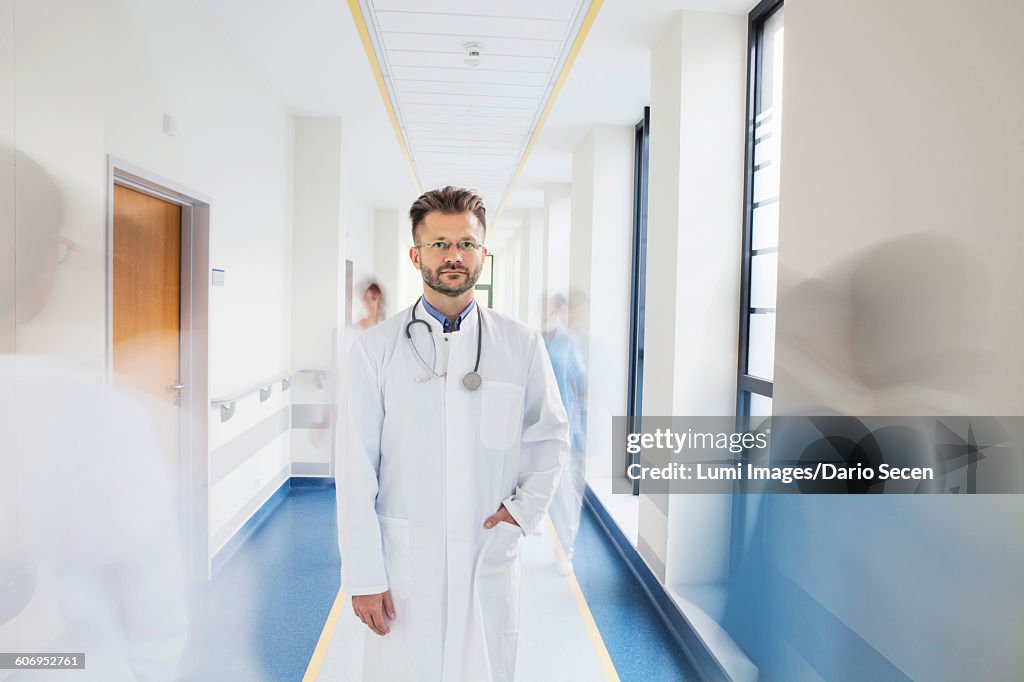 Doctor standing in corridor of medical clinic