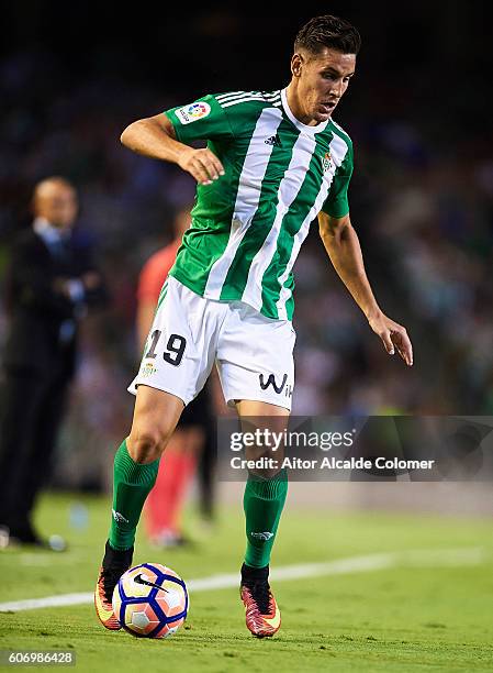 Alex Alegria of Real Betis Balompie in action during the match between Real Betis Balompie vs Granada CF as part of La Liga at Benito Villamarin...