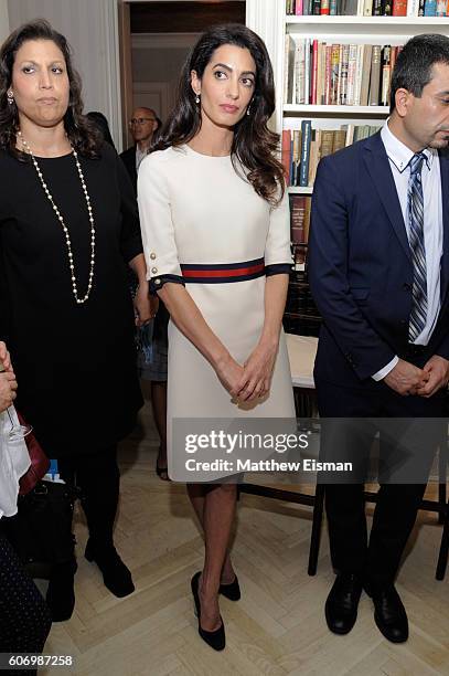 Amal Clooney attends the Women In The World reception honoring appointment of UN Office on Drugs and Crime Goodwill Ambassador Nadia Murad on...