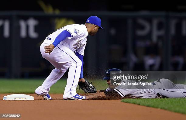 Christian Colon of the Kansas City Royals tags out Adam Eaton of the Chicago White Sox as he attempts to steal second during the 1st inning of the...