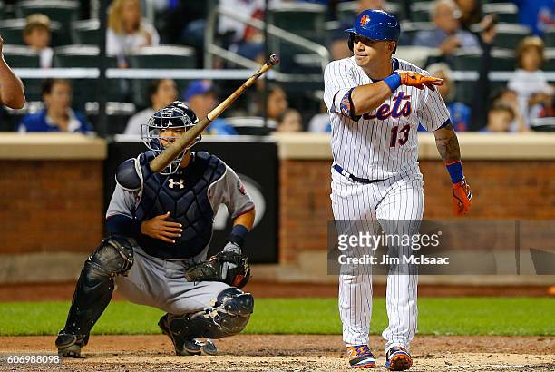 Asdrubal Cabrera of the New York Mets flips his bat after his third inning home run as Kurt Suzuki of the Minnesota Twins looks on at Citi Field on...