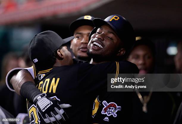 Gregory Polanco of the Pittsburgh Pirates celebrates with Drew Hutchison after hitting a home run in the first inning against the Cincinnati Reds at...