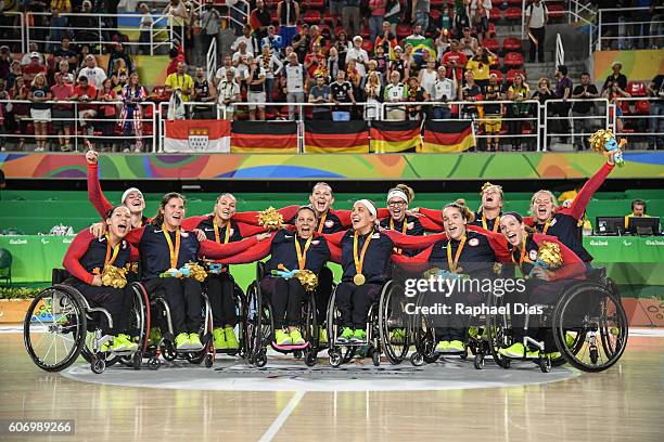 Gold medalist team United States celebrate on the podium of the Womens Wheelchair Basketball on day 9 of the Rio 2016 Paralympic Games at the Rio...