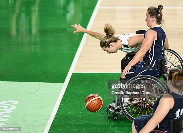 Gail Gaeng and Jennifer Poist of United States and Johanna Welin of Germany competes during the Womens Wheelchair Basketball gold medal match between...