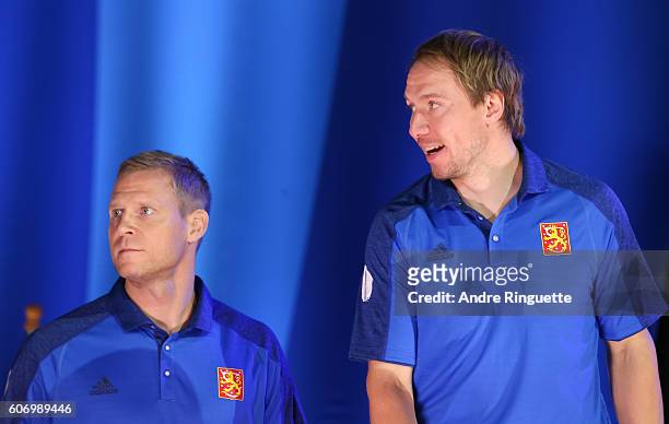 Mikko Koivu and Jussi Jokinen of Team Finland take to the stage for the opening ceremonies during the World Cup of Hockey 2016 at the Distillery...