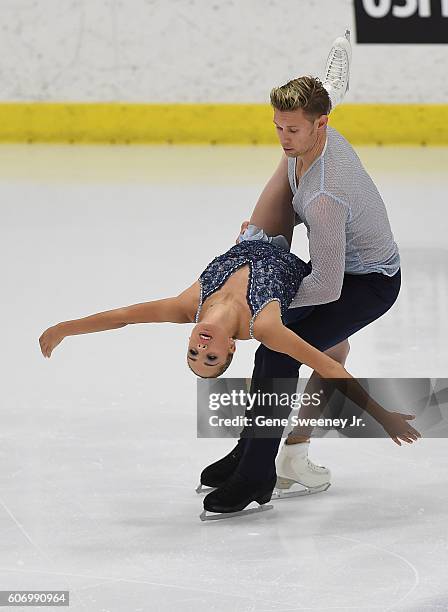 First place finisher, Brittany Jones and Joshua Reagan of Canada compete in the pairs free skate program at the U.S. International Figure Skating...