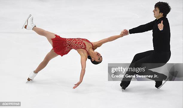 Second place finisher, Jessica Calalang and Zack Sidhu of the United States compete in the pairs free skate program at the U.S. International Figure...