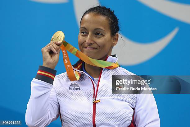 Gold medalist Teresa Perales of Spain celebrates on the podium at the medal ceremony for the Women's 50m Backstroke - S5 on day 9 of the Rio 2016...