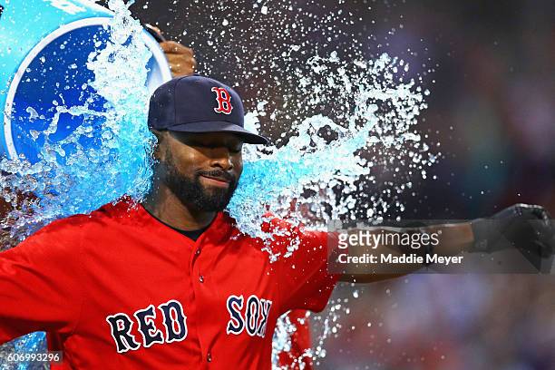 Jackie Bradley Jr. #25 of the Boston Red Sox is doused in Powerade after Boston Red Sox defeat the New York Yankees 7-4 at Fenway Park on September...