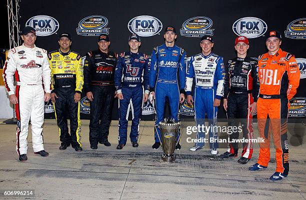 Timothy Peters, driver of the Red Horse Racing Toyota, Matt Crafton, driver of the Fisher Nuts/Menards Toyota, Johnny Sauter, driver of the Alamo...