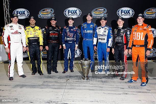 Timothy Peters, driver of the Red Horse Racing Toyota, Matt Crafton, driver of the Fisher Nuts/Menards Toyota, Johnny Sauter, driver of the Alamo...