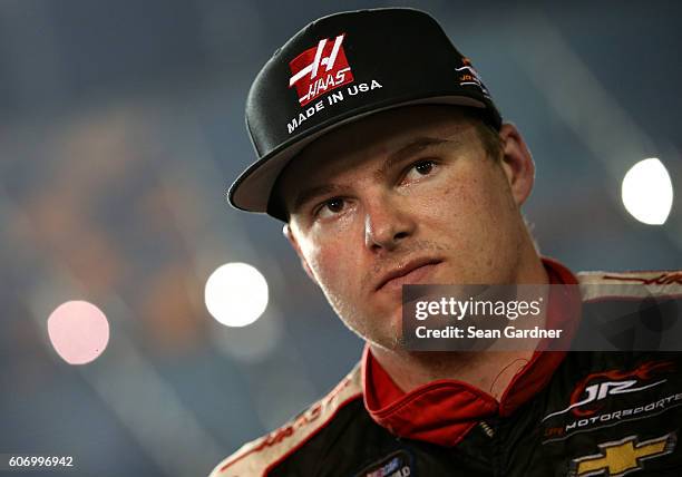 Cole Custer, driver of the Haas Automation Chevrolet, speaks with the media after the NASCAR Camping World Truck Series American Ethanol E15 225 at...