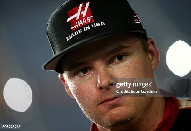 Cole Custer, driver of the Haas Automation Chevrolet, speaks with the media after the NASCAR Camping World Truck Series American Ethanol E15 225 at...