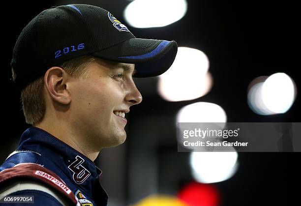 William Byron, driver of the Liberty University Toyota, looks on after the NASCAR Camping World Truck Series American Ethanol E15 225 at Chicagoland...