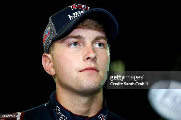 William Byron, driver of the Liberty University Toyota, is interviewed on the grid after the NASCAR Camping World Truck Series American Ethanol E15...