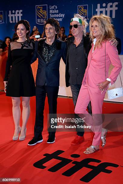 Sally Wood, musicians Ronnie Wood, Keith Richards and wife Patti Richards attend 'The Rolling Stones Ole Ole Ole!: A Trip Across Latin America'...