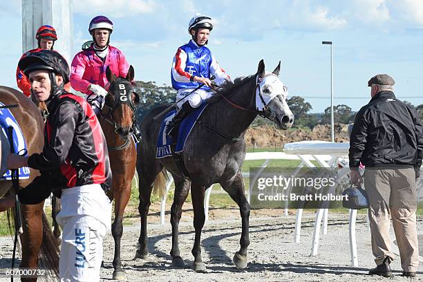 Stephanie Thornton returns to the mounting yard on Magwitch after winning PRC Membership BM58 Handicap at Racing.com Park Synthetic Racecourse on...