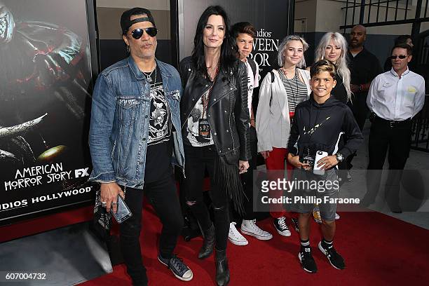 Slash and his family attend the opening night celebration of "Halloween Horror Nights" at Universal Studios Hollywood on September 16, 2016 in...