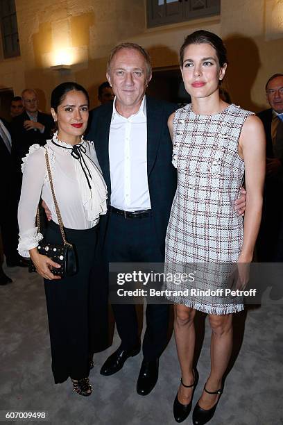 Of Kering Group, Francois-Henri Pinault standing between his wife actress Salma Hayek and Charlotte Casiraghi attend the 4O Rue de Sevres : Preview...