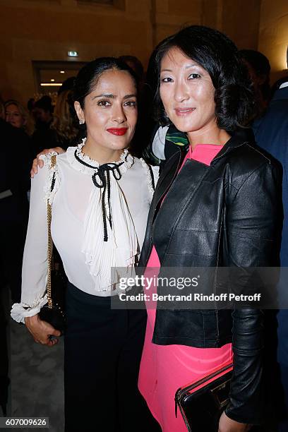 Actress Salma Hayek and politician Fleur Pellerin attend the 4O Rue de Sevres : Preview at the Head Offices of Both Kering and Balenciaga. Building....