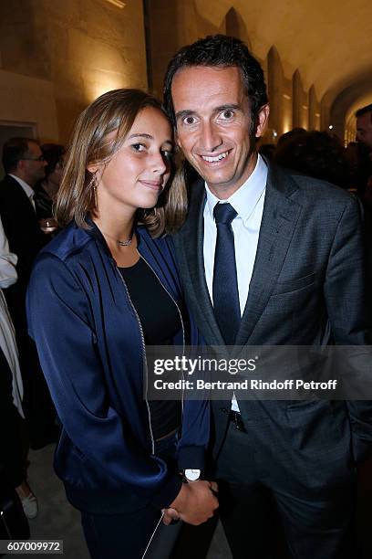 Of Fnac Alexandre Bompard and his daughter attend the 4O Rue de Sevres : Preview at the Head Offices of Both Kering and Balenciaga. Building. The...