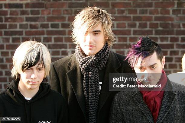 British pop musicians, from left, James Bourne, Charlie Simpson, and Matt Jay, all of the group Busted, arrive for a 20th anniversary re-recording...