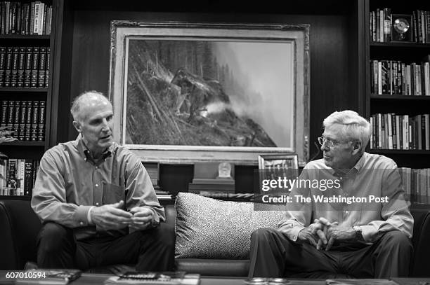 Mark V. Holden, senior vice president and general counsel Koch Industries is photographed with his boss Charles Koch in Koch's office in Wichita,...