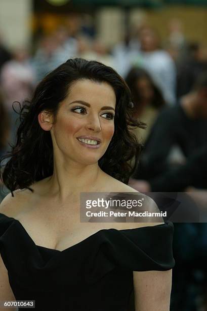 British television presenter and food writer Nigella Lawson arrives for the opening of the Saatchi Gallery, London, England, April 15, 2003.