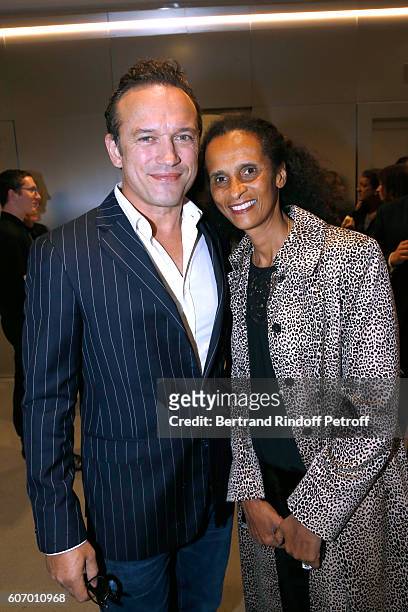 Vincent Perez and his wife Karine Silla attend the 4O Rue de Sevres : Preview at the Head Offices of Both Kering and Balenciaga. Building. The site...