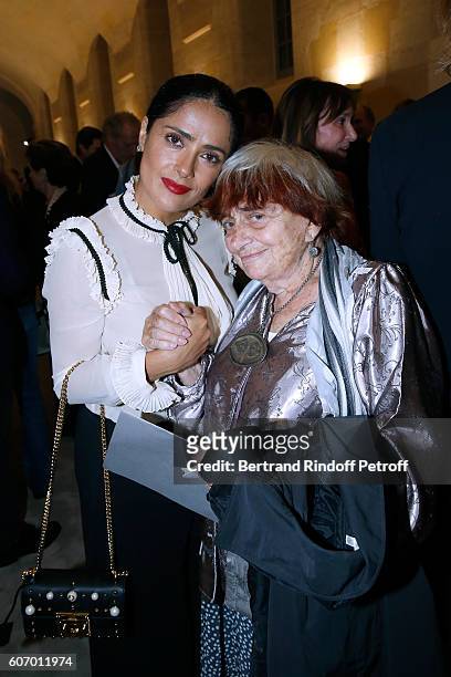 Actress Salma Hayek and photographer Agnes Varda attend the 4O Rue de Sevres : Preview at the Head Offices of Both Kering and Balenciaga. Building....