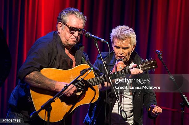 Musicians Steve Jones and Billy Idol perform onstage at 'Hey! Ho! Let's Go: Celebrating 40 Years Of The Ramones' at The GRAMMY Museum on September...