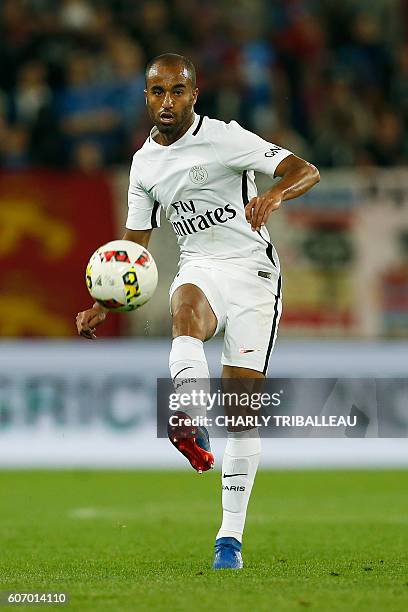 Paris Saint-Germain's Brazilian midfielder Lucas Moura passes the ball during the French L1 football match between Caen and Paris , on September 16,...