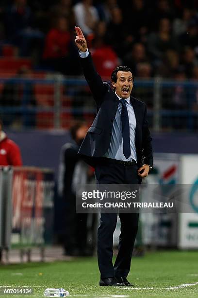 Paris Saint-Germain's Spanish headcoach Unai Emery gestures during the French L1 football match between Caen and Paris , on September 16, 2016 at the...