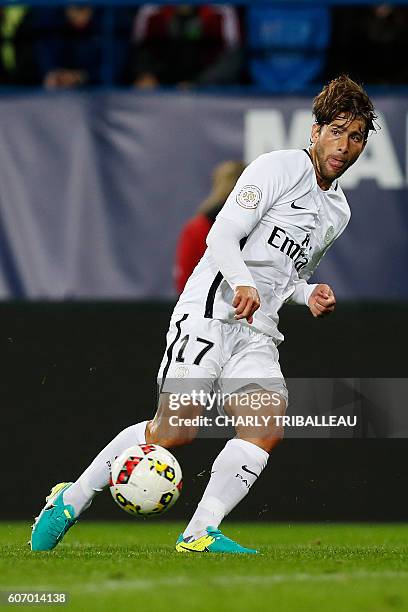 Paris Saint-Germain's Brazilian defender Maxwell passes the ball during the French L1 football match between Caen and Paris , on September 16, 2016...