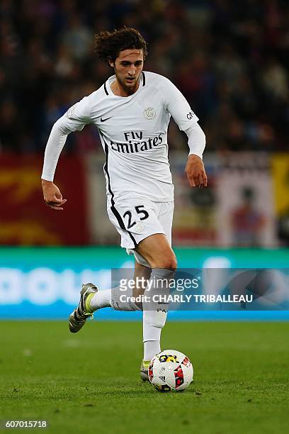 Paris Saint-Germain's Argentinian forward Angel Di Maria controls the ball during the French L1 football match between Caen and Paris , on September...