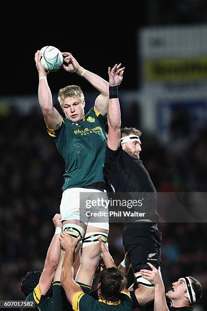 Pieter-Steph Du Toit of South Africa clears the ball from the lineout under pressure from Kieran Read of the All Blacks during the Rugby Championship...