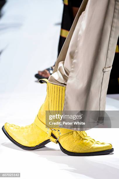 Model, shoes detail, walks the runway during the Hood By Air fashion show at The Arc, Skylight at Moynihan Station on September 11, 2016 in New York...