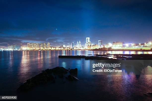 montevideo skyline at night, puertito del buceo, uruguay - buceo stock pictures, royalty-free photos & images