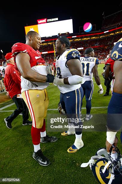 Trent Brown of the San Francisco 49ers and Jamon Brown of the Los Angeles Rams talk on the field following the game at Levi Stadium on September 12,...