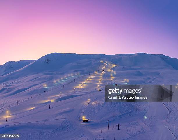 ski slopes at twilight, akureyri, iceland - akureyri stock-fotos und bilder