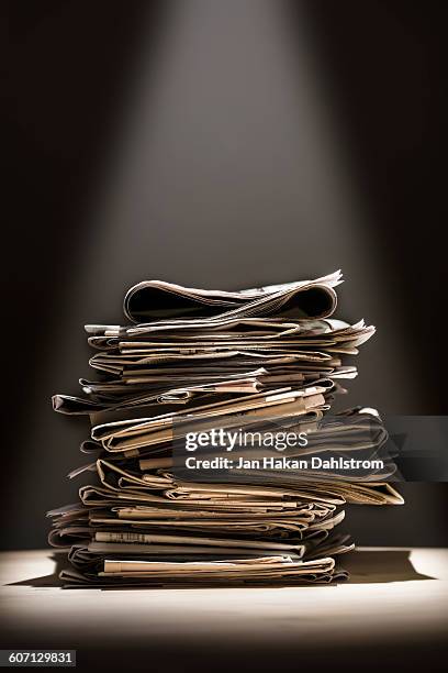 stacked newspapers - newspaper stack stock pictures, royalty-free photos & images