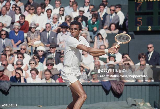 American tennis player Arthur Ashe pictured in action during his semi final match against Rod Laver of Australia at The Championships, Wimbledon...