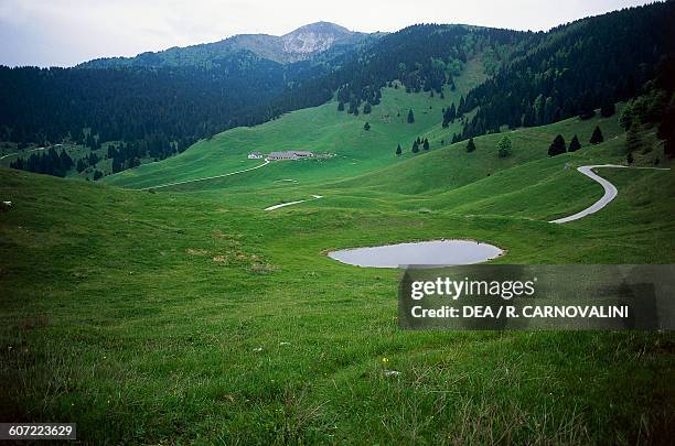Stizzon river Valley, Mount Grappa in the background, Veneto, Italy.