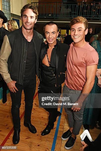 Thom Evans, Julien Macdonald and Tom Daley attend the Julien Macdonald runway show during London Fashion Week Spring/Summer collections 2017 on...