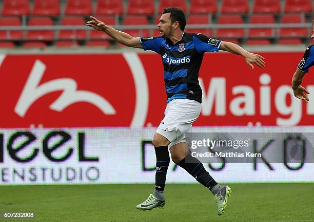 Massimo Ornatelli of Frankfurt jubilates after scoring the first goal during the third league match between Hallescher FC and FSV Frankfurt at...